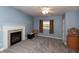 Cozy bedroom featuring a fireplace, neutral carpet and light blue walls at 251 Howard Rd, Greenwood, IN 46142