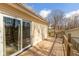 A wooden deck with sliding glass doors offers a great outdoor space for relaxation at 251 Howard Rd, Greenwood, IN 46142