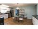 Bright kitchen featuring a breakfast area, stainless steel appliances, and white cabinetry at 251 Howard Rd, Greenwood, IN 46142
