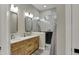 Bright bathroom featuring marble walls, a walk-in shower, and -and- sinks at 2753 Stones Bay Dr, Greenwood, IN 46143