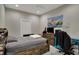 This bedroom has a ceiling fan, a TV, and a gray bed at 2753 Stones Bay Dr, Greenwood, IN 46143
