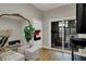 Bright exercise room with mirror and access to outdoor patio and an adjacent bedroom at 2753 Stones Bay Dr, Greenwood, IN 46143