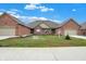 Beautiful lawn, new construction homes with brick exteriors and attached garages at 2753 Stones Bay Dr, Greenwood, IN 46143