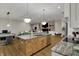 Modern open concept kitchen featuring granite counters, stainless appliances and an island at 2753 Stones Bay Dr, Greenwood, IN 46143