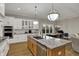 Open concept kitchen with granite counters and stainless-steel appliances with living area at 2753 Stones Bay Dr, Greenwood, IN 46143