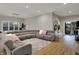 Bright living room featuring a large sectional sofa and plenty of space for entertaining at 2753 Stones Bay Dr, Greenwood, IN 46143
