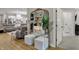 Stylish living room with a large mirror, elegant console table, and modern decor at 2753 Stones Bay Dr, Greenwood, IN 46143