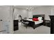 This main bedroom has a ceiling fan, Peloton exercise bike, and neutral decor at 2753 Stones Bay Dr, Greenwood, IN 46143