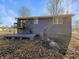 Exterior of the house with a wooden deck and stairs at 2928 Sheffield Dr, Indianapolis, IN 46229