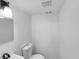 Compact half bathroom with light fixture and vanity at 2928 Sheffield Dr, Indianapolis, IN 46229