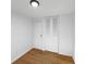 Bedroom offers hardwood floors, neutral walls, and ample closet space, offering a serene and functional space at 2928 Sheffield Dr, Indianapolis, IN 46229