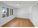 Bedroom boasts hardwood floors, a closet, and a large window, making it a perfect space for relaxation at 2928 Sheffield Dr, Indianapolis, IN 46229