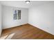 Bedroom with hardwood flooring and natural light, offering a comfortable and inviting atmosphere at 2928 Sheffield Dr, Indianapolis, IN 46229