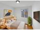 Cozy bedroom with a comfortable bed, stylish lamps, and a window with a view at 2928 Sheffield Dr, Indianapolis, IN 46229