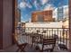 A comfortable balcony with a view of nearby buildings in an urban setting at 355 E Ohio St # 221, Indianapolis, IN 46204