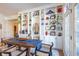 Bright dining area featuring custom built-ins, hardwood floors, and lots of natural light at 355 E Ohio St # 221, Indianapolis, IN 46204