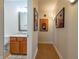 Hallway provides bathroom access and features unique wall art decorations at 355 E Ohio St # 221, Indianapolis, IN 46204