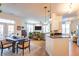 Spacious living area with hardwood floors, a ceiling fan, and lots of natural light at 355 E Ohio St # 221, Indianapolis, IN 46204