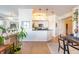 Bright open-concept living space with modern kitchen and dining area, great for entertaining at 355 E Ohio St # 221, Indianapolis, IN 46204