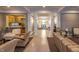 Lobby lounge area with comfortable seating and views to kitchen and hallway at 355 E Ohio St # 221, Indianapolis, IN 46204