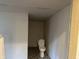 Small bathroom showing toilet at 3817 N Sheridan Ave, Indianapolis, IN 46226