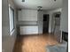 Bright kitchen featuring white cabinets, granite countertops, and stainless steel appliances at 3817 N Sheridan Ave, Indianapolis, IN 46226