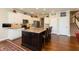 Well-lit kitchen with granite countertops, modern cabinetry, and stainless steel appliances at 3941 Stratfield Way, Westfield, IN 46074