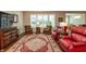 Inviting living room with hardwood floors, large windows, and stylish decor at 3941 Stratfield Way, Westfield, IN 46074
