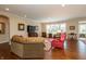Open living space with hardwood floors, neutral walls, and ample natural light at 3941 Stratfield Way, Westfield, IN 46074