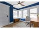 Office space featuring a desk, chair, storage chest, and lots of natural light from the windows at 3960 N Park Ave, Indianapolis, IN 46205