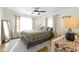 Well-lit bedroom featuring hardwood floors, neutral walls, and large windows with curtains at 3960 N Park Ave, Indianapolis, IN 46205