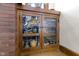 Charming built-in cabinet with glass doors and decorative items at 3960 N Park Ave, Indianapolis, IN 46205