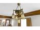 Vintage chandelier with ornate design and wood trim at 3960 N Park Ave, Indianapolis, IN 46205