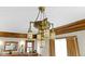 Ornate chandelier with vintage design and wood trim at 3960 N Park Ave, Indianapolis, IN 46205