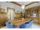 Dining room features wood trim, built-in hutch, and doorway leading to bathroom at 3960 N Park Ave, Indianapolis, IN 46205