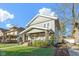 Charming two-story home with a welcoming front porch and well-maintained lawn at 3960 N Park Ave, Indianapolis, IN 46205