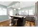Stylish kitchen with a marble island, pendant lighting, and modern appliances at 3960 N Park Ave, Indianapolis, IN 46205