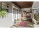 Cozy front porch with a table and chairs, offering a relaxing outdoor space at 3960 N Park Ave, Indianapolis, IN 46205