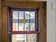 Colorful stained glass window with wood frame at 3960 N Park Ave, Indianapolis, IN 46205