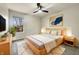 Serene bedroom with natural light, wooden furniture, and modern decor at 5099 Nicodemus Dr, Plainfield, IN 46168