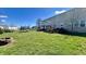 Large backyard with a trampoline and covered patio, great for entertaining at 5941 Bonneville Way, Indianapolis, IN 46237