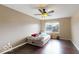 Bedroom with hardwood floors, one window, and a neutral paint color at 5941 Bonneville Way, Indianapolis, IN 46237