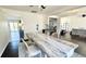 Open-concept dining area with a large table perfect for entertaining, flowing into other living spaces at 5941 Bonneville Way, Indianapolis, IN 46237