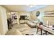 Cozy living room with a television, couch, and storage at 5941 Bonneville Way, Indianapolis, IN 46237