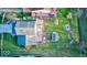 Aerial view of the property showcasing the backyard, deck, playground, and surrounding landscape at 628 Southridge Ct, Westfield, IN 46074