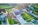 Aerial view of the home showcasing the garage, front yard and mature trees at 628 Southridge Ct, Westfield, IN 46074