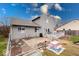 Expansive backyard with a patio area, swing set, and well-kept lawn at 628 Southridge Ct, Westfield, IN 46074