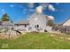 Spacious backyard with a deck, playground, and grassy area for outdoor activities at 628 Southridge Ct, Westfield, IN 46074