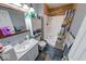 Well-lit bathroom featuring a shower-tub combo, modern vanity, and neutral flooring at 628 Southridge Ct, Westfield, IN 46074