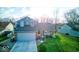 Charming two-story home with an attached garage, well-manicured lawn, and inviting front porch at 628 Southridge Ct, Westfield, IN 46074